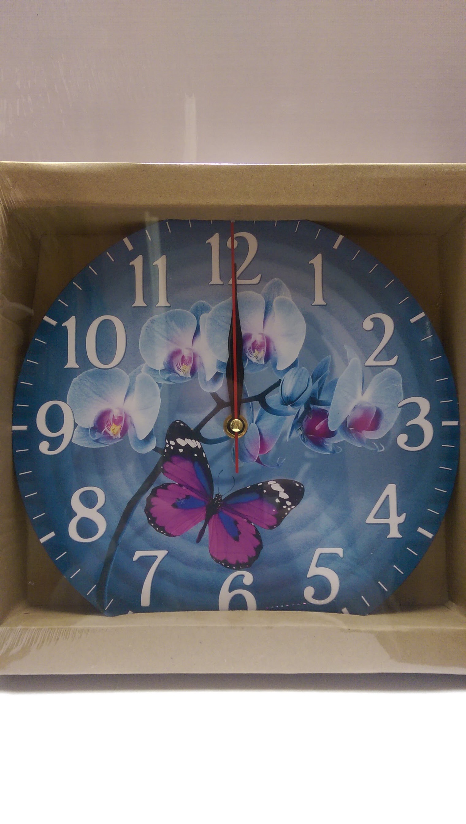 Tyrkysové hodiny Motýľ